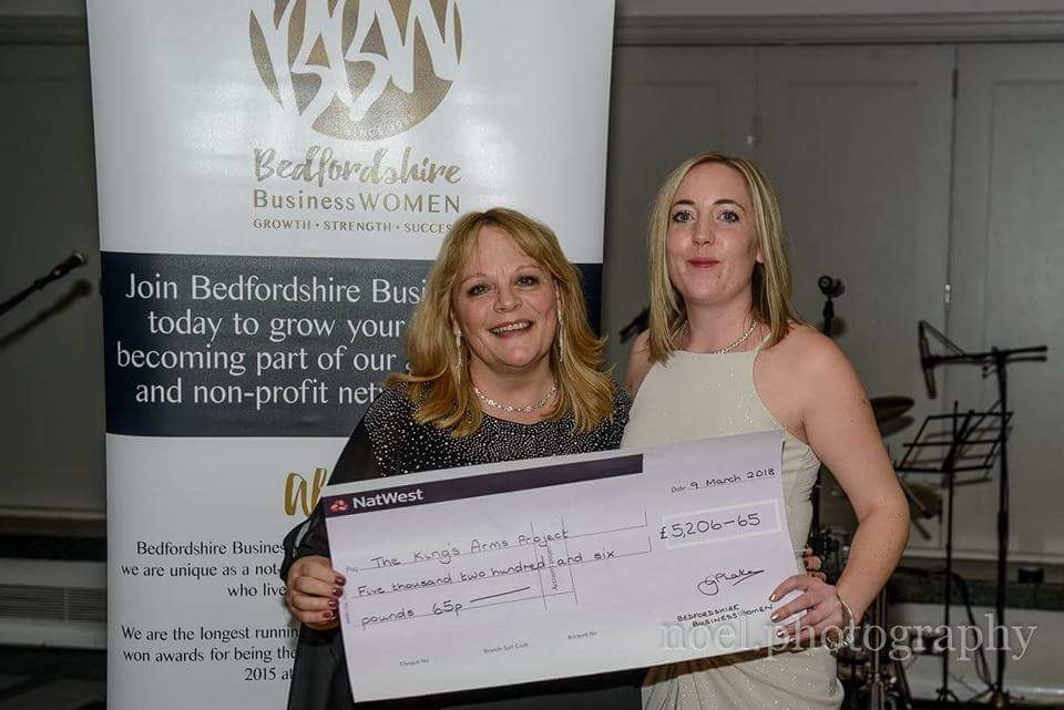 Philomena presenting a cheque for over £5,000 to The Kings Arms Project