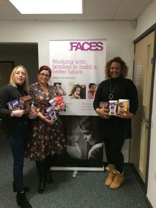 Members of the Watton team pass Easter eggs on to FACES
